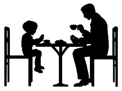 Silhouette of Father and Son Eating Together